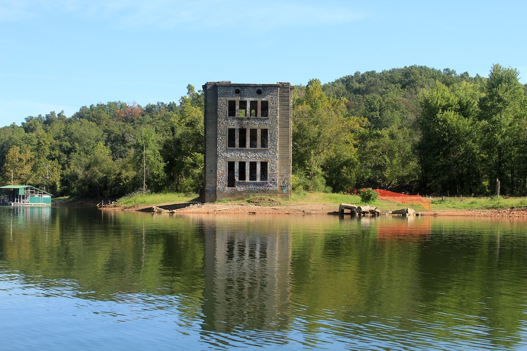 lone tower by a lake