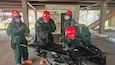Soldiers and Airmen of the Kentucky National Guard's Chemical, Biological, Radiological, Nuclear and high-yield explosives (CBRNE) Enhanced Response Force Package (CERFP) Search and Extraction (S&E) team record atmospheric readings of a contaminated area during their external evaluation at Muscatatuck Training Center, July 29 through Aug. 1, 2025. (Courtesy photo)