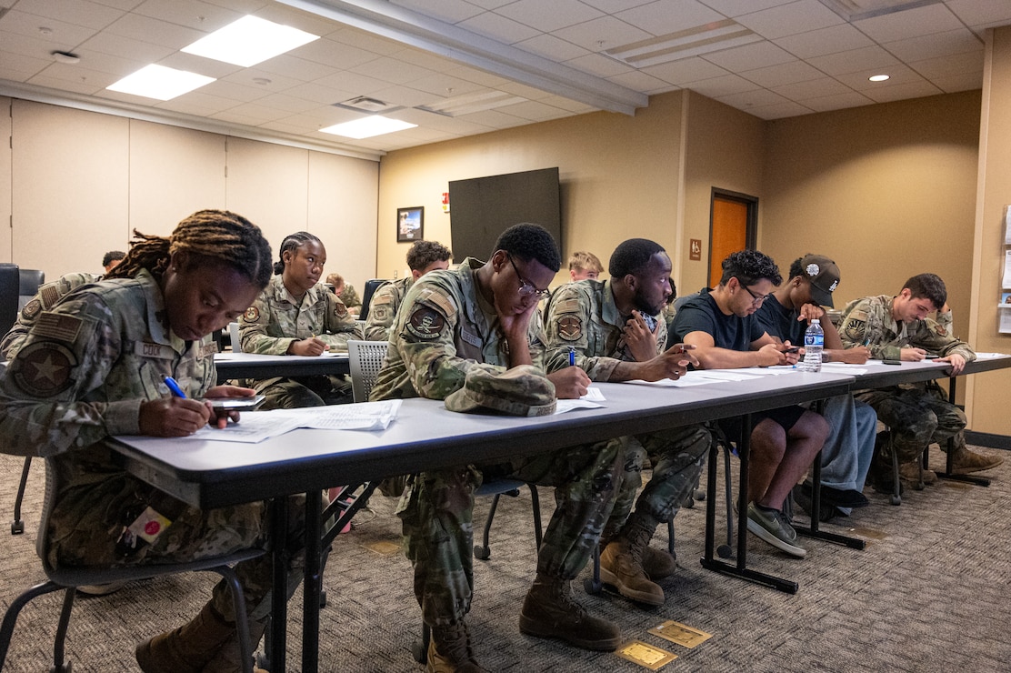 U.S. Air Force Airmen with the 2nd Bomb Wing attend a financial planning class  offered by the Military and Family Readiness Center at Barksdale Air Force Base, Louisiana, Aug. 7, 2025. Financial advice is one of the many services Airmen can receive from the Military and Family Readiness Center. (U.S. Air Force photo by Airman 1st Class Aaron Hill)
