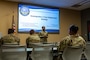 U.S. Air Force Master Sgt. Jasmine Tanner, Military and Family Readiness Center readiness noncommissioned officer in charge, gives a post-deployment brief to Barksdale Airmen at Barksdale Air Force Base, Louisiana, Aug. 6, 2025. Post-deployment briefings offer Airmen the opportunity to learn how to better reintegrate themselves, and resources to help them manage their finances and mental health. (U.S. Air Force photo by Airman 1st Class Aaron Hill)