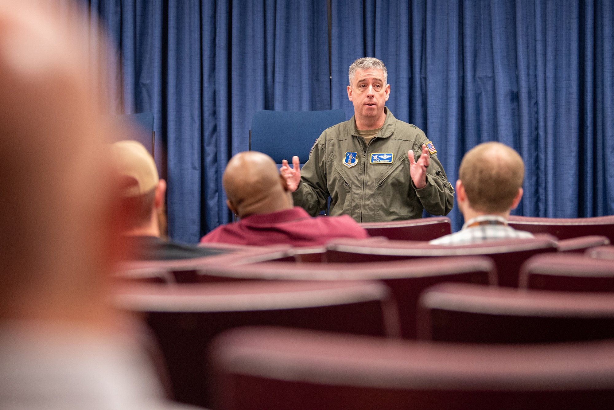 Brig. Gen. Bruce Bancroft, Kentucky’s assistant adjutant general for Air, gives a pre-flight briefing to a group of civilian employers at the Kentucky Air National Guard Base in Louisville, Ky., May 14, 2025. The employers flew aboard a Kentucky Guard C-130J Super Hercules aircraft to Paducah, Ky., to observe an earthquake-response exercise as part of an Employer Support of the Guard and Reserve “Bosslift,” a federal program designed to enhance employers’ understanding of Guard missions by offering an inside perspective on military operations. (U.S. Air National Guard photo by Phil Speck)