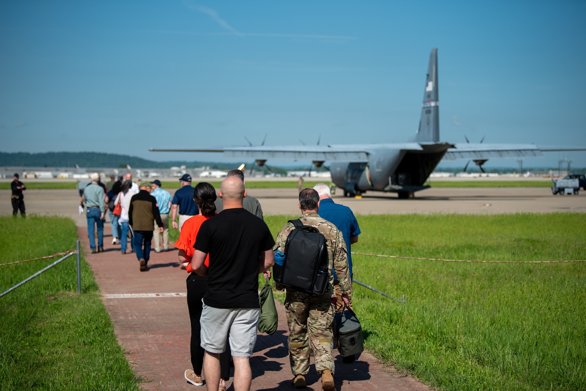 A group of civilian employers boards a C-130J Super Hercules aircraft at the Kentucky Air National Guard Base in Louisville, Ky., May 14, 2025, for an orientation flight to Paducah, Ky. The flight was part of an Employer Support of the Guard and Reserve “Bosslift,” a community outreach program designed to enhance employers’ understanding of Guard missions by offering an inside perspective on military operations. (U.S. Air National Guard photo by Phil Speck)
