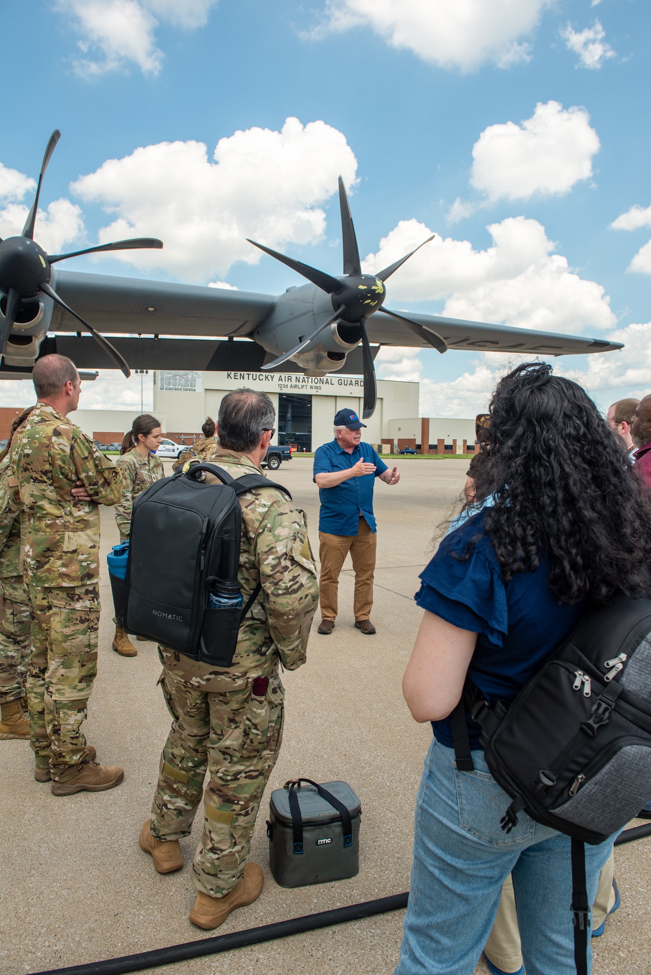 Retired U.S. Army Brig. Gen. Mike Richie, chairperson of the Kentucky Committee for Employer Support of the Guard and Reserve, briefs a group of civilian employers before they board a C-130J Super Hercules aircraft at the Kentucky Air National Guard Base in Louisville, Ky., May 14, 2025, for an orientation flight to Paducah, Ky. The flight was part of an ESGR “Bosslift,” a community outreach program designed to enhance employers’ understanding of Guard missions by offering an inside perspective on military operations. (U.S. Air National Guard photo by Senior Airman Annaliese Billings)