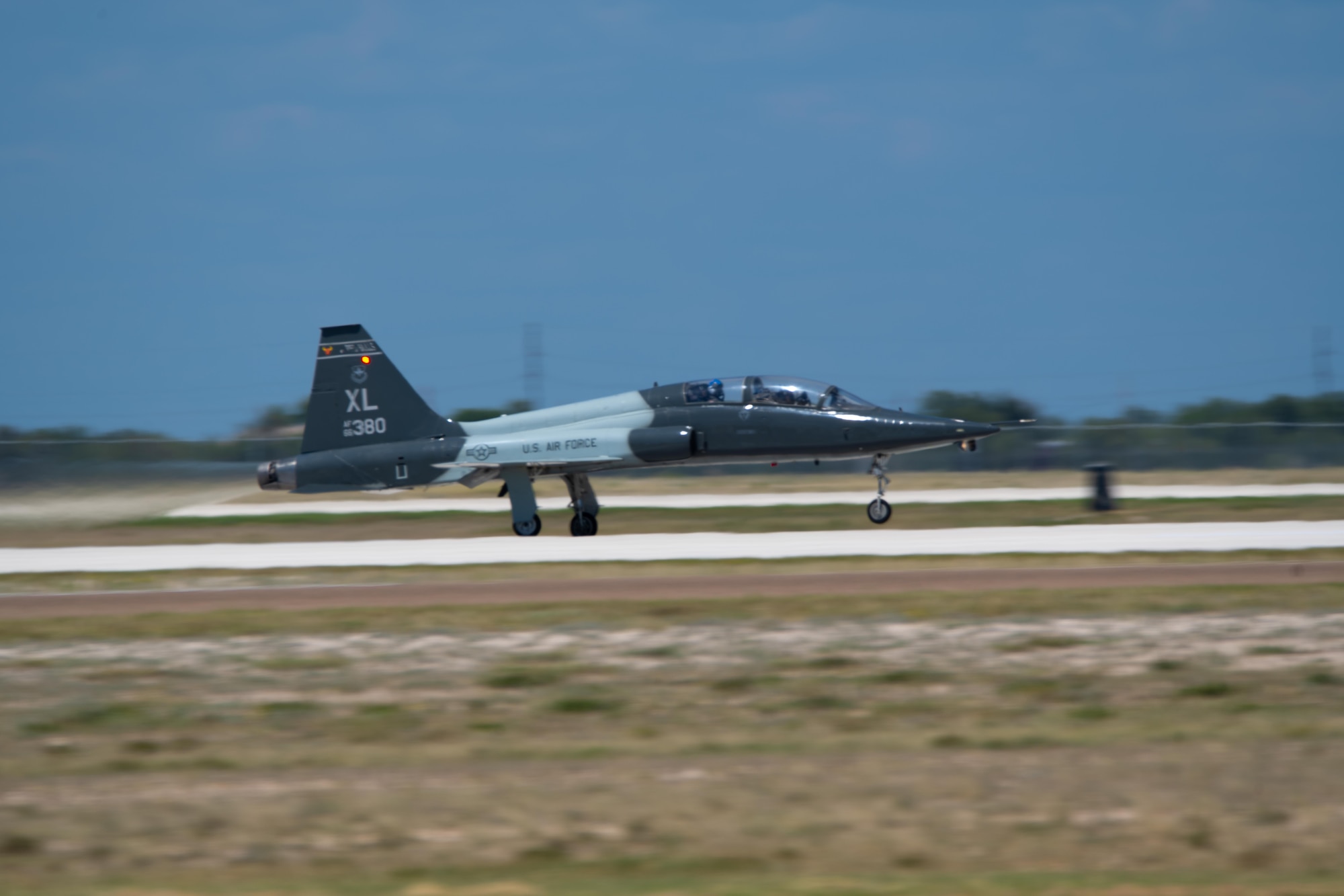 A T-38C Talon assigned to the 47th Flying Training Wing takes off during a non-standard airspace exercise at Laughlin Air Force Base, Texas, Aug. 7, 2025. The scenario incorporated fighter and bomber fundamentals to enhance instructor pilots’ ability to operate in complex airspace environments. (U.S. Air Force photo by Airman 1st Class Harrison Sullivan)
