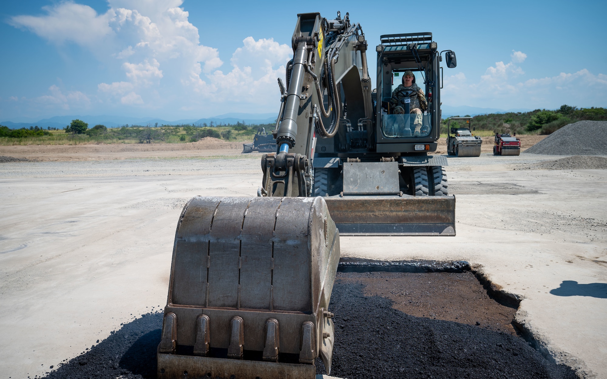 Airman operates machinery.