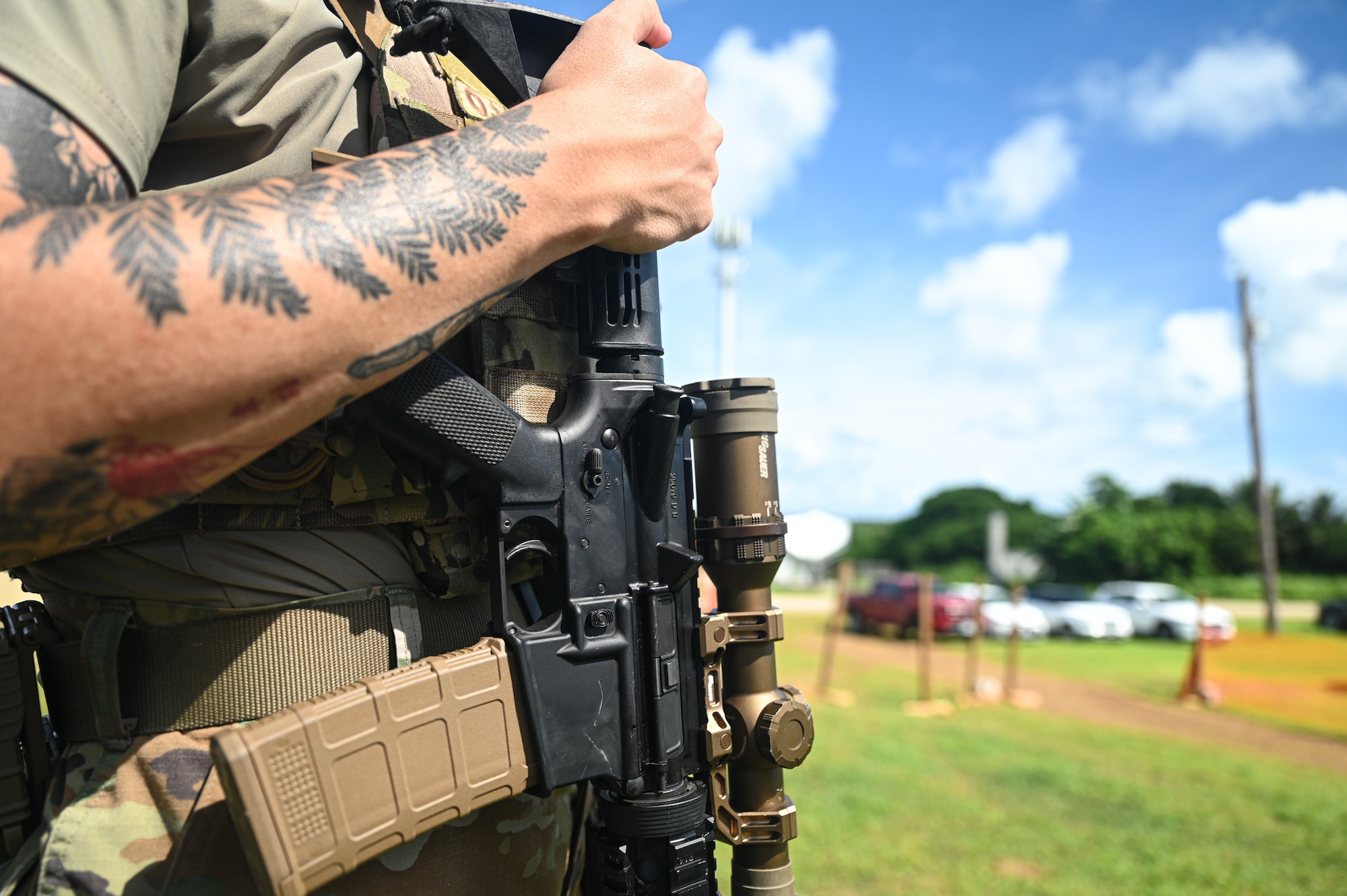 A U.S. Air Force Airman from the 11th Combat Air Base Squadron stands by to perform security inspections at an entry control point in Saipan, Northern Mariana Islands, July 16, 2025, during exercise Resolute Force Pacific. The 11 CABS’ primary function is to provide the 11th Air Task Force base operations support, but its members are also trained in the Air Force’s Mission Ready Airmen model to enable them to support other mission needs. (U.S. Air Force photo by Senior Airman Andrew Garavito)