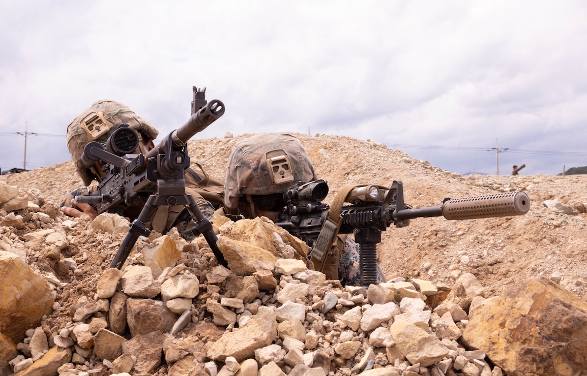 U.S. Marines with 2nd Battalion, 23rd Marines, forward deployed with 4th Marine Regiment, 3rd Marine Division as part of the Unit Deployment Program, maintain security during a field operation as part of the Korean Marine Exercise Program 25.2, Pohang, South Korea, Aug. 7, 2025.
