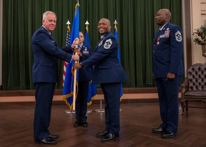 Woods accepting guidon