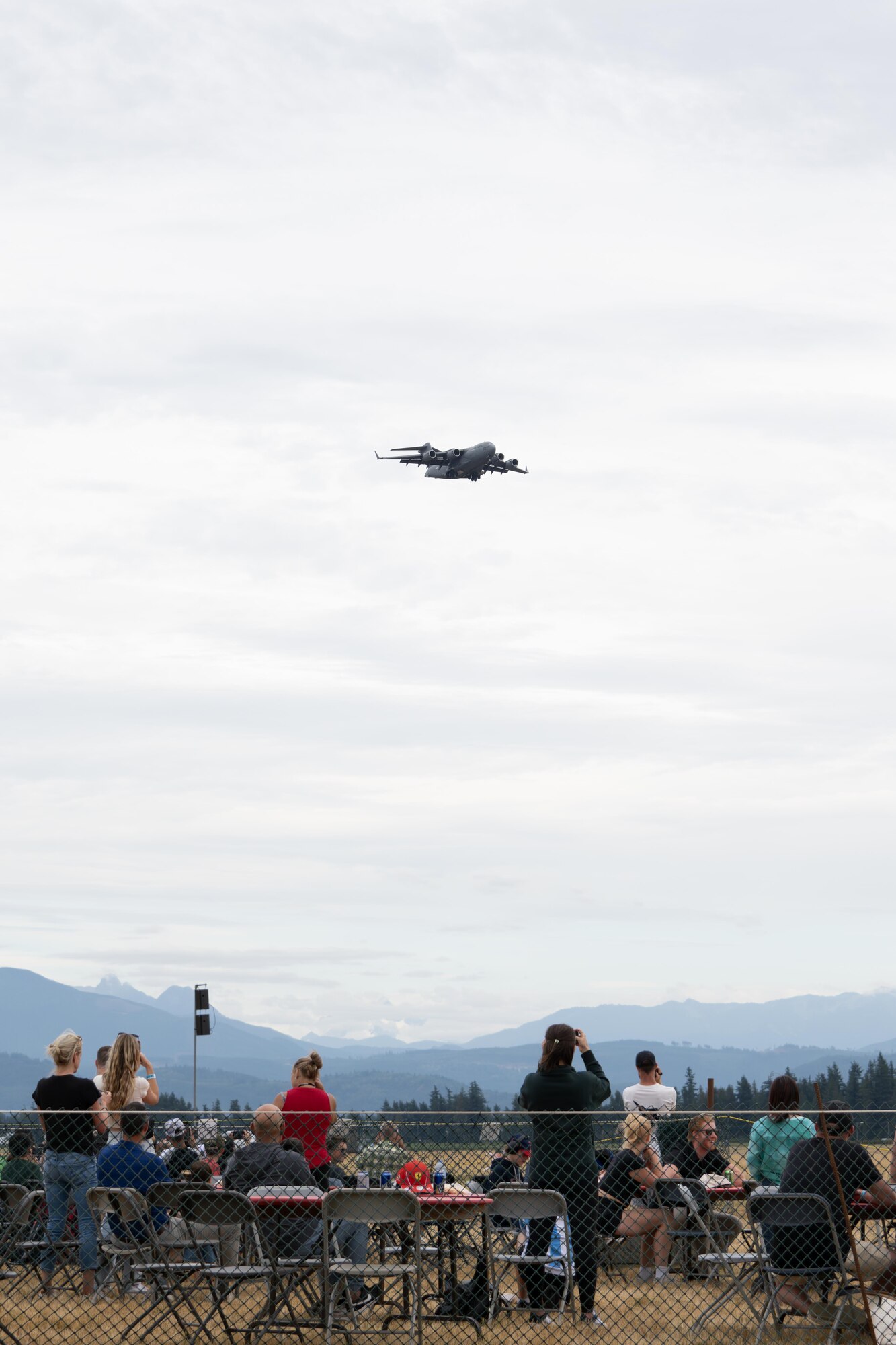 A U.S. Air Force C-17 Globemaster III aircraft assigned to the 97th Air Mobility Wing flies in the skies over the Abbotsford International Air Show in Abbotsford, Canada, Aug. 8, 2025. The C-17 performed multiple maneuvers to showcase the capabilities of the aircraft known as the “moose”. (U.S. Air Force photo by Airman 1st Class Lauren Torres)