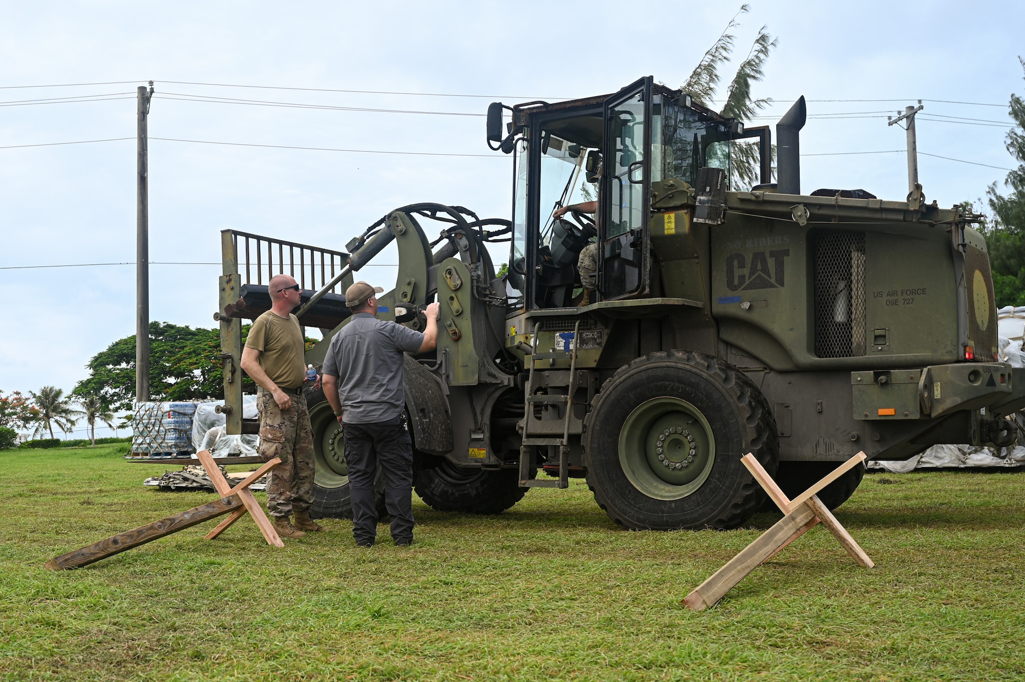 A U.S. Air Force Airman with the 11th Combat Air Base Squadron operates heavy machinery during base sustainment operations in support of exercise Resolute Force Pacific in Saipan, Northern Mariana Islands, July 14, 2025. The 11 CABS has the ability to establish expeditionary locations to deliver command and control and base operating support–integration in support of Department of Defense priorities around the world. (U.S. Air Force photo by 2nd Lt. Grace Brandt)