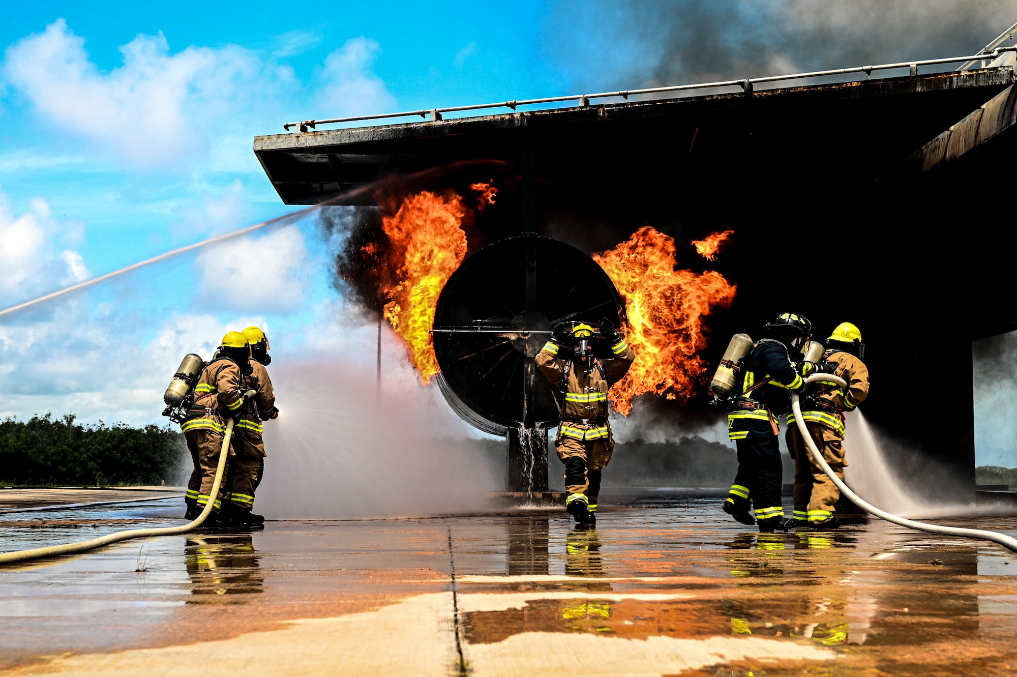 A U.S. Air Force Airman with the 11th Combat Air Base Squadron directs his team to
reposition while combating a simulated aircraft fire during exercise Resolute Force Pacific in Saipan, Northern Mariana Islands, July 17, 2025. REFORPAC is part of the first-in-a-generation Department-Level Exercise series, a new way of conducting operations in a contested, dynamic environment to build capabilities making a stronger, deterrent force. (U.S. Air Force photo by Senior Airman Andrew Garavito)