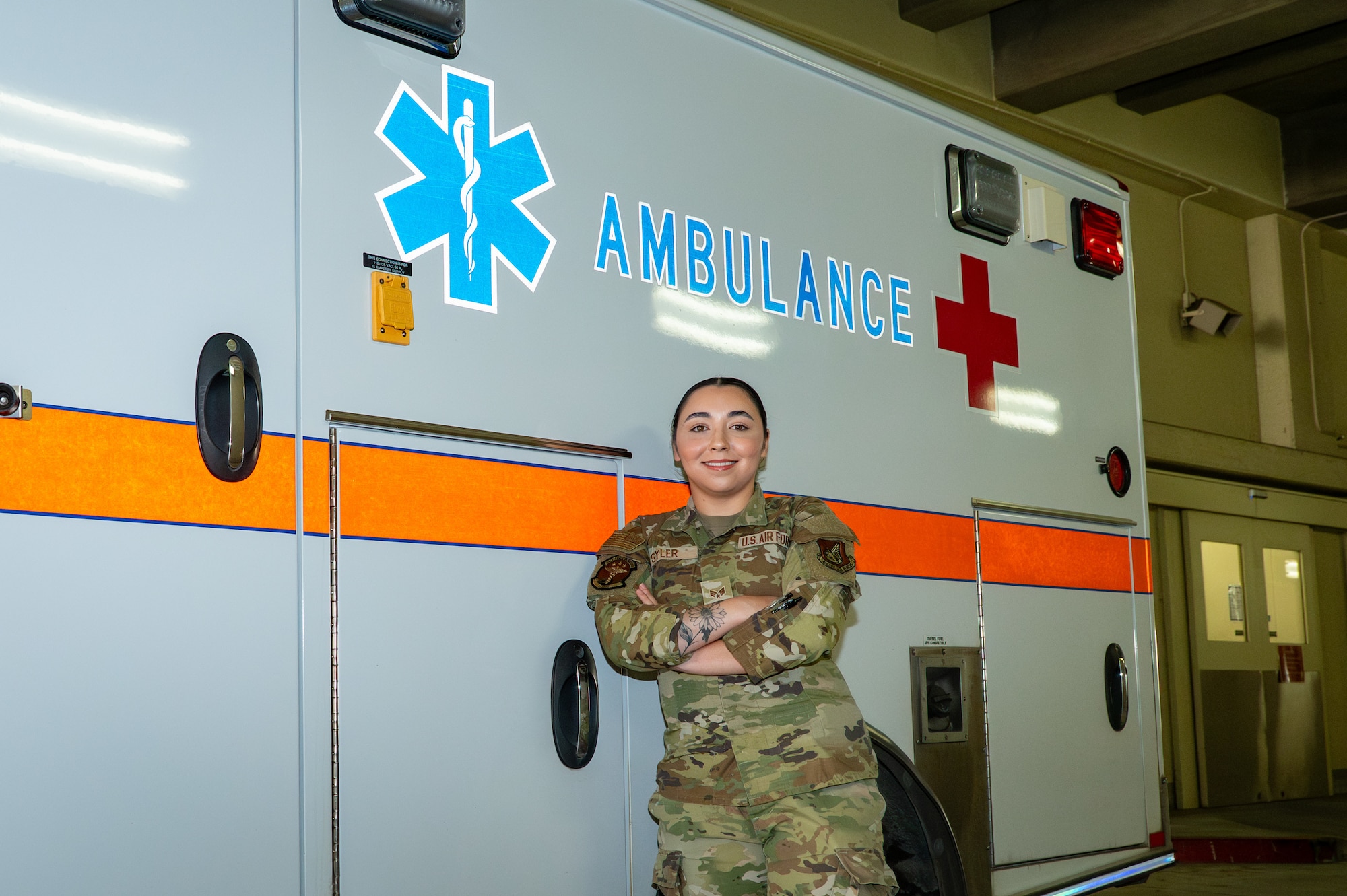 Wild Weasel of the Week (WWoW), U.S. Air Force Senior Airman Alexis Syler, 35th Healthcare Operations Squadron emergency services technician, poses in front of an ambulance at her work center at Misawa Air Base, Japan, Aug 13, 2025