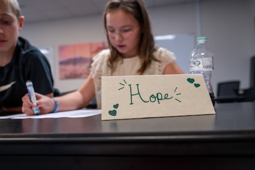 Students from Yokota Middle School work on an activity during the Student Ambassador Training Program at the Military and Family Readiness Center on Yokota Air Base, Japan.