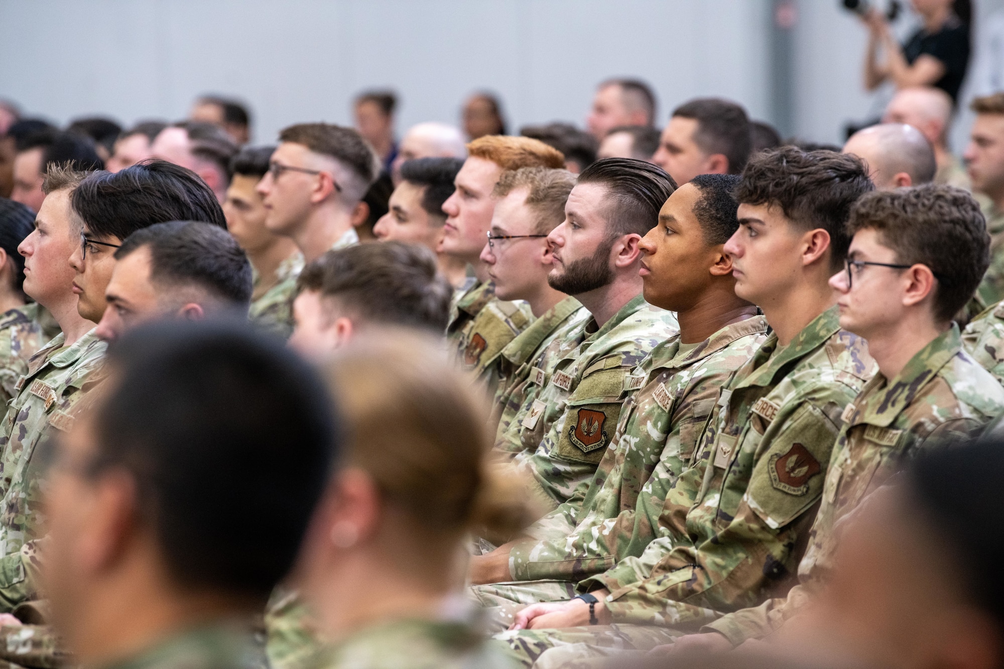 Attendees listen to remarks from U.S. Vice President JD Vance