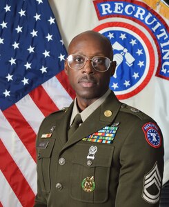 Male Soldier in front of American and United States Army Recruiting Command flags