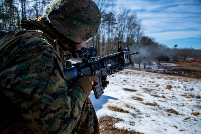 A student fires an M203 grenade launcher during Warrant Officer Basic Course 1-19 on Marine Corps Base Quantico, Virginia, Feb. 21, 2019. WOBC is designed to train and educate newly appointed and commissioned warrant officers in a variety of skills required to transition from enlisted Marine to officer, with particular emphasis on the duties, responsibilities and warfighting skills required of a rifle platoon commander. (U.S. Marine Corps photo by Warrant Officer Kowshon Ye)