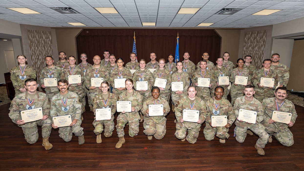 Wright-Patterson Air Force Base senior airmen selected for promotion to staff sergeant pose for a group photo at the Wright-Patt Club, Aug. 8, 2025. Air Force officials selected 15,894 senior airmen for promotion to staff sergeant out of 47,007 eligible, a selection rate of 33.81 percent in the 25E5 promotion cycle, 165 of which are based at Wright-Patt. (U.S. Air Force photo by Daniel Peterson)