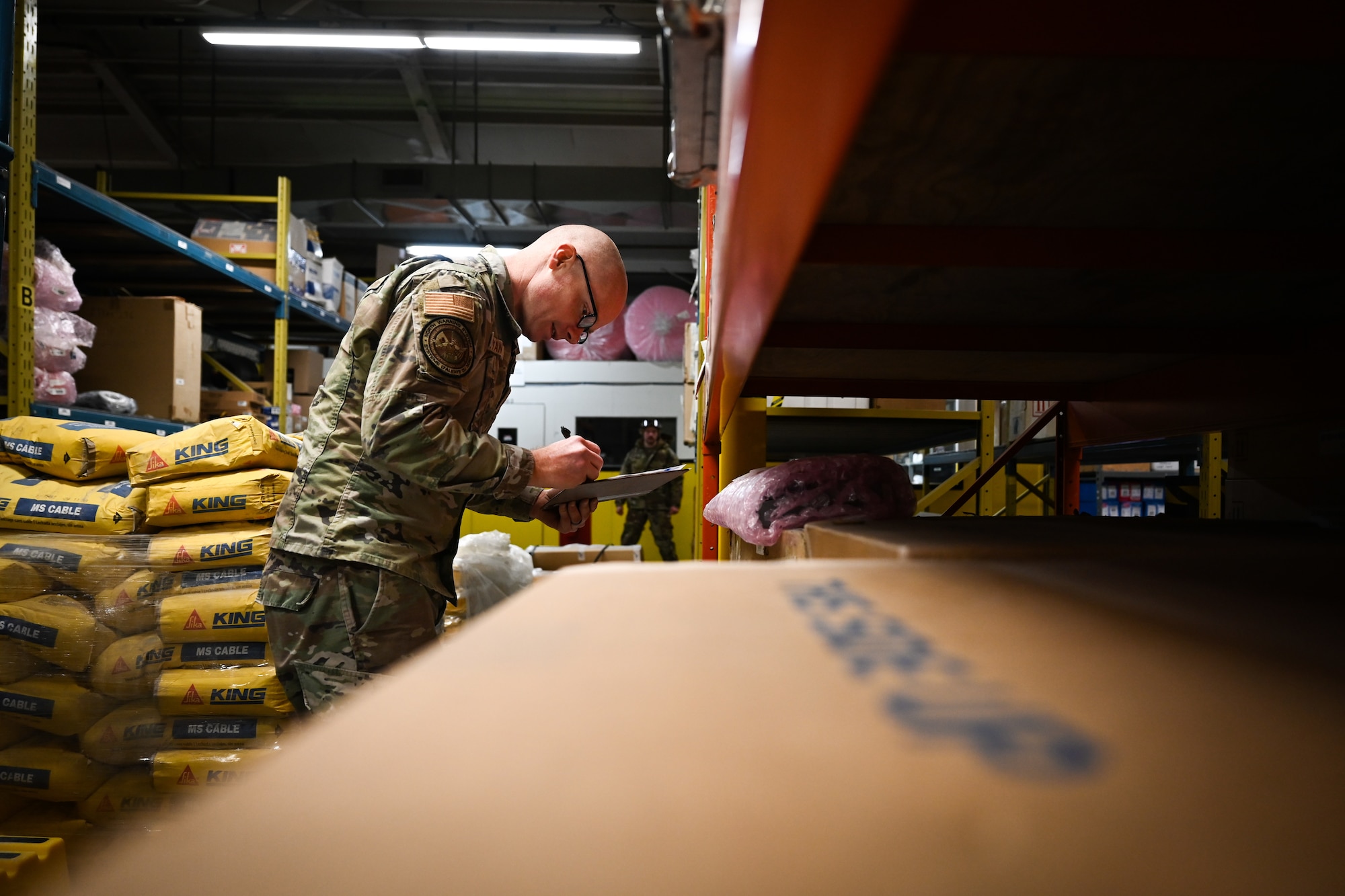 An Airman performs inventory of radar parts.