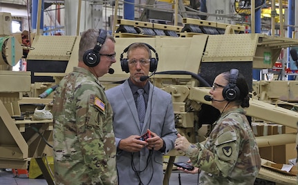CHAMBERSBURG, Pa. - Lt. Gen. Chris Mohan (left), Army Materiel Command deputy commanding general and AMC acting commander, and Maj. Gen. Lori Robinson (right), Army Aviation and Missile Command commanding general, along with Dale McClanahan, Letterkenny Army Depot Future Systems Integration Office chief, discuss depot capabilities during a tour of the depot on August 12.

The tours included discussions on continuous transformation, flexible production space, support to regional sustainment framework, joint workload, and LEAD’s strategy to partner artisans’ experience with technology.