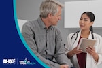 Man in grey shirt speaks to a doctor