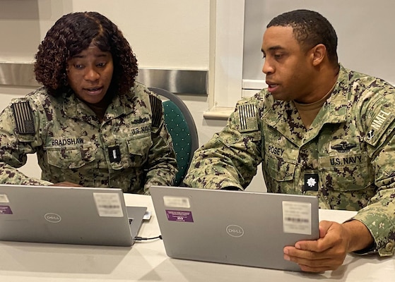 250708-N-N1574-1001 NAPLES, Italy (August 4-8, 2025) Naval Medical Forces Atlantic (NMFL) participate in Large Scale Exercise 2025 (LSE 25) for the first time marking a major milestone. During the exercise, Lt.j.g Afiya Bradshaw, Future Operations Officer, and Cmdr. Ray Posey NMFL Director, Maritime Operations Center (acting) and Forward Officer in Charge for the exercise, review the common operating picture of Expeditionary Medical Teams. LSE 2025 integrates participants from six U.S. Navy and U.S. Marine Corps component commands and seven U.S. numbered fleets across 22 time zones and is intended to refine how the military synchronizes maritime operations on a global scale. The exercise provides a venue to test and refine current and new technologies and platforms to reinforce the Navy’s current position as a supreme maritime force and provide feedback used to inform future innovation. (U.S. Navy Photo by Cmdr. Tiffany Lerch)
