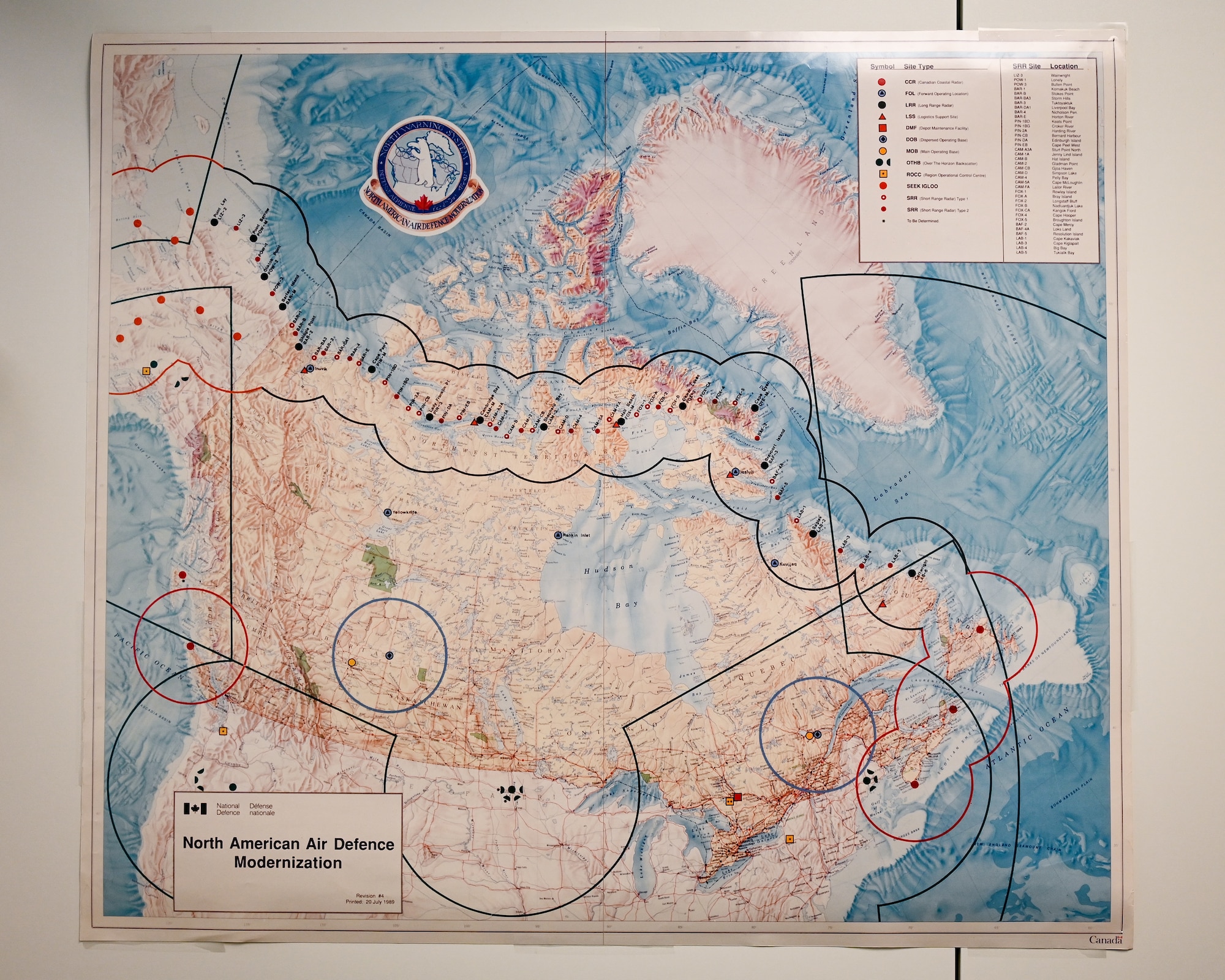 An old map of the chain of radar sites within the North Warning System rests on a wall at Ottawa.