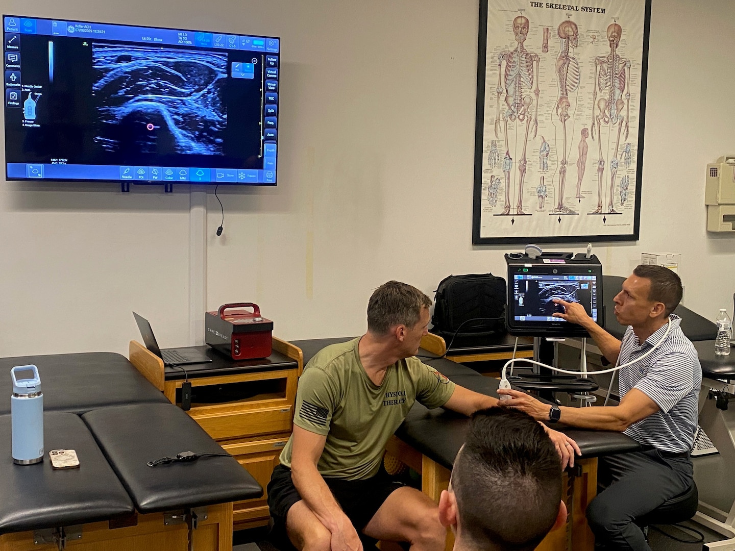 Lt. Col. Jon Umlauf, Associate Professor, George Washington University Doctor of Physical Therapy Program, demonstrates the utility of point-of-care ultrasound (POCUS) as a valuable tool in forward battlefield medicine during the Kersey Advanced Clinical & Operational Practice Course held at West Point on August 4-8, 2025. POCUS provides immediate diagnostic information in austere, resource-limited environments.