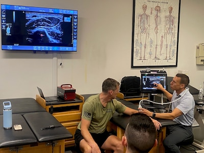 Lt. Col. Jon Umlauf, Associate Professor, George Washington University Doctor of Physical Therapy Program, demonstrates the utility of point-of-care ultrasound (POCUS) as a valuable tool in forward battlefield medicine during the Kersey Advanced Clinical & Operational Practice Course held at West Point on August 4-8, 2025. POCUS provides immediate diagnostic information in austere, resource-limited environments.