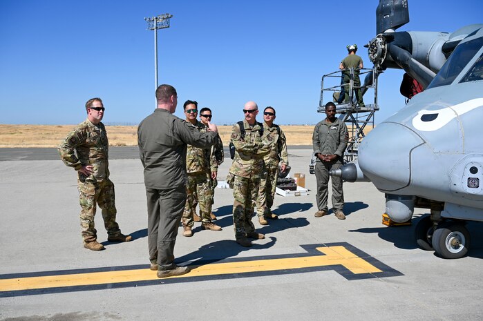 Airmen around an aircraft