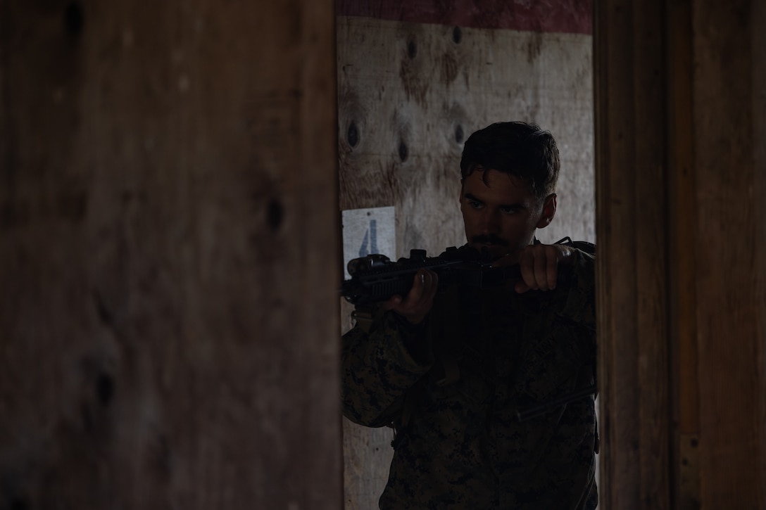 U.S. Navy Petty Officer Third Class Grant Jasinski, a corpsman with 2nd Battalion, 23rd Marines, forward deployed with 4th Marine Regiment, 3d Marine Division as part of the Unit Deployment Program, rehearses room clearing tactics during bilateral military operations in urban terrain training during the Korean Marine Exercise Program 25.2 in Pocheon, South Korea, July 25, 2025. KMEP is conducted regularly between the ROK and U.S. Marine Corps to increase their combined capabilities through realistic training geared towards deterrence and maintaining peace in the Indo-Pacific. (U.S. Marine Corps photo by Lance Cpl. Van Hoang)
