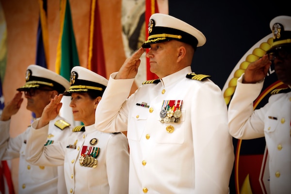 SILVER SPRING, Md. (Aug. 13, 2025) Capt. Eric Welsh salutes the colors during Naval Medical Research Command's (NMRC) Change of Command ceremony. The ceremony, presided over by Rear Adm. Guido Valdes, saw Capt. Franca Jones relieved as commander by Welsh. Valdes recently served as commander, Naval Medical Forces Pacific. NMRC, headquarters of Navy Medicine Research & Development, is engaged in a broad spectrum of activity from basic science in the laboratory to field studies in austere and remote areas of the world to investigations in operational environments. In support of Navy, Marine Corps and joint U.S. warfighter health, readiness and lethality, researchers study infectious diseases, biological warfare detection and defense, combat casualty care, environmental health concerns, aerospace and undersea medicine, operational mission support and epidemiology. (U.S. Navy Photo by Tommy Lamkin/ released)