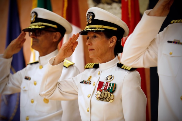 SILVER SPRING, Md. (Aug. 13, 2025) Capt. Franca Jones, commander, Naval Medical Research Command (NMRC), salutes the colors during NMRC'S Change of Command ceremony. The ceremony, presided over by Rear Adm. Guido Valdes, saw Jones relieved as commander by Capt. Eric Welsh. Valdes recently served as commander, Naval Medical Forces Pacific. NMRC, headquarters of Navy Medicine Research & Development, is engaged in a broad spectrum of activity from basic science in the laboratory to field studies in austere and remote areas of the world to investigations in operational environments. In support of Navy, Marine Corps and joint U.S. warfighter health, readiness and lethality, researchers study infectious diseases, biological warfare detection and defense, combat casualty care, environmental health concerns, aerospace and undersea medicine, operational mission support and epidemiology. (U.S. Navy Photo by Tommy Lamkin/ released)