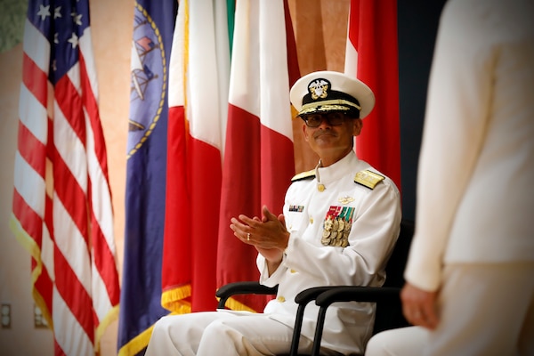 SILVER SPRING, Md. (Aug. 13, 2025) Rear Adm. Guido Valdes applauds Capt. Franca Jones, commander, Naval Medical Research Command (NMRC), following her speech at NMRC's Change of Command ceremony. The ceremony, presided over by Valdes, saw Jones relieved as commander by Capt. Eric Welsh. Valdes recently served as commander, Naval Medical Forces Pacific. NMRC, headquarters of Navy Medicine Research & Development, is engaged in a broad spectrum of activity from basic science in the laboratory to field studies in austere and remote areas of the world to investigations in operational environments. In support of Navy, Marine Corps and joint U.S. warfighter health, readiness and lethality, researchers study infectious diseases, biological warfare detection and defense, combat casualty care, environmental health concerns, aerospace and undersea medicine, operational mission support and epidemiology. (U.S. Navy Photo by Tommy Lamkin/ released)