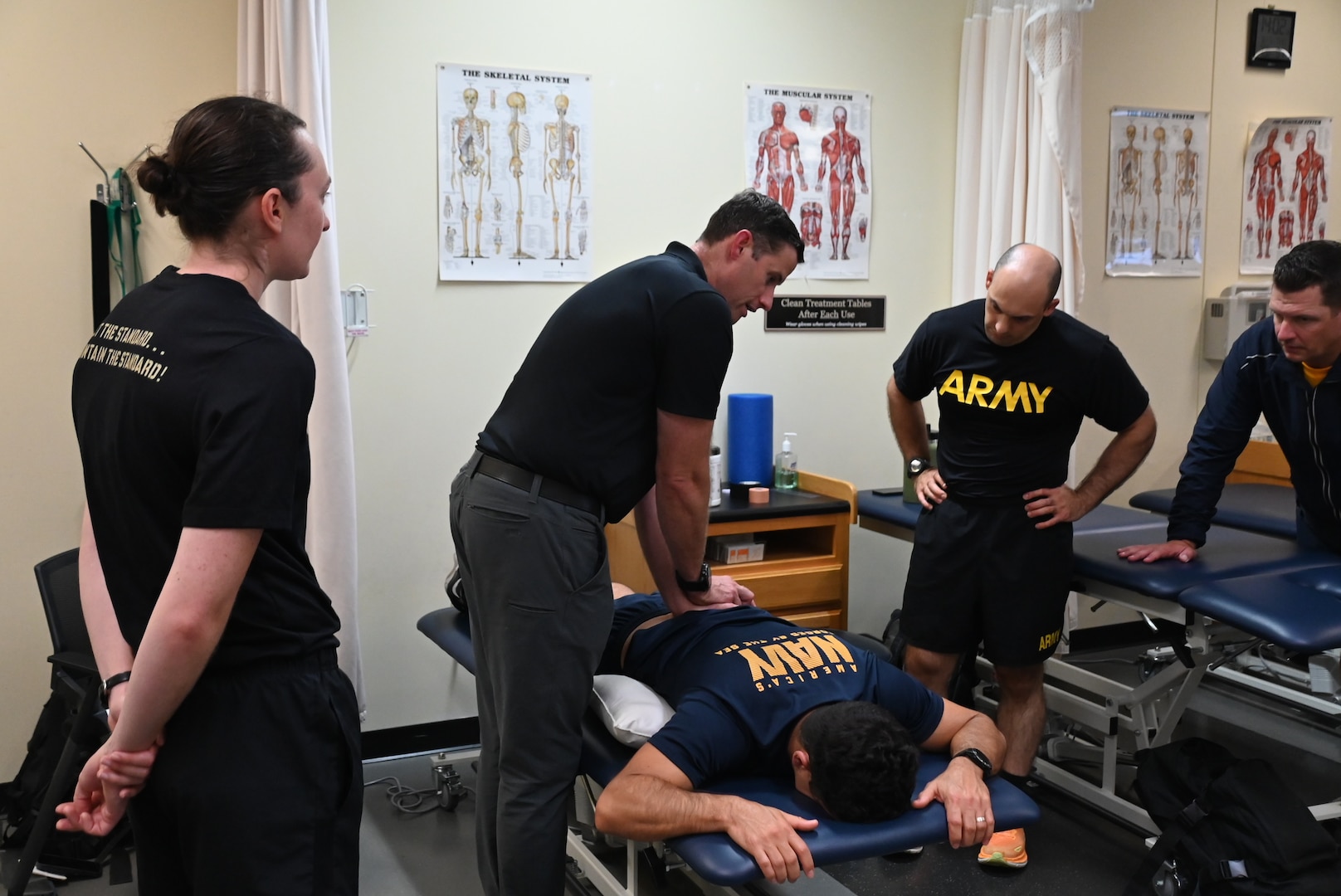 Maj. Steven Hunter, a Physical Therapist from Fort Bragg, N.C., demonstrates manual lumbar assessment and treatment techniques during the Kersey Advanced Clinical & Operational Practice Course held at West Point on August 4-8, 2025.