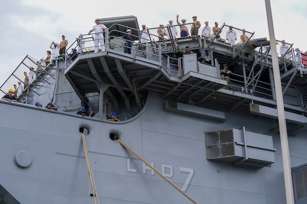 NORFOLK, Va. (Aug. 14, 2025) - Sailors and Marines man the rails aboard the Wasp-class amphibious assault ship USS Iwo Jima (LHD 7) as it departs Naval Station Norfolk for a regularly scheduled deployment. Sailors and Marines of the Iwo Jima Amphibious Ready Group (IWO ARG) - 22nd Marine Expeditionary Unit (MEU) Special Operations Capable (SOC) departed Norfolk and Camp Lejeune, North Carolina after completing a comprehensive, nine-month training program. (U.S. Navy photo by Mass Communication Specialist 1st Class Clay Whaley)