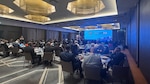 wide view from workshop hall with participants
