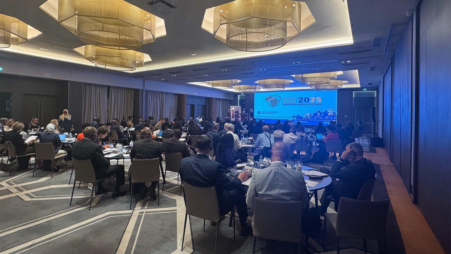 wide view from workshop hall with participants