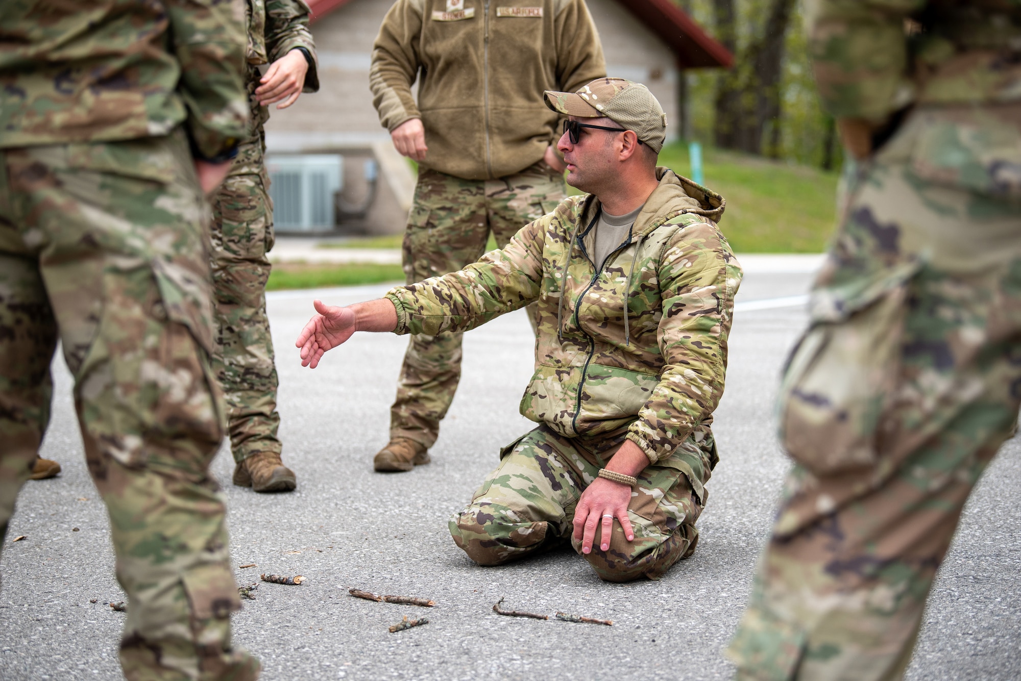 Tech. Sgt. John Keller, assistant flight chief with the Colorado Air National Guard’s 233rd Security Forces Squadron, teaches an unmounted patrol class at the Alpena Combat Readiness Training Center in Alpena, Mich., May 25, 2025. More than 50 Airmen from the Kentucky Air National Guard, along with members of the Colorado Air Guard’s 233rd  Security Forces Squadron and the Ecuadorian Air Force, participated in a nine-day field exercise here May 21 to 29. (U.S. Air National Guard photo by Phil Speck)