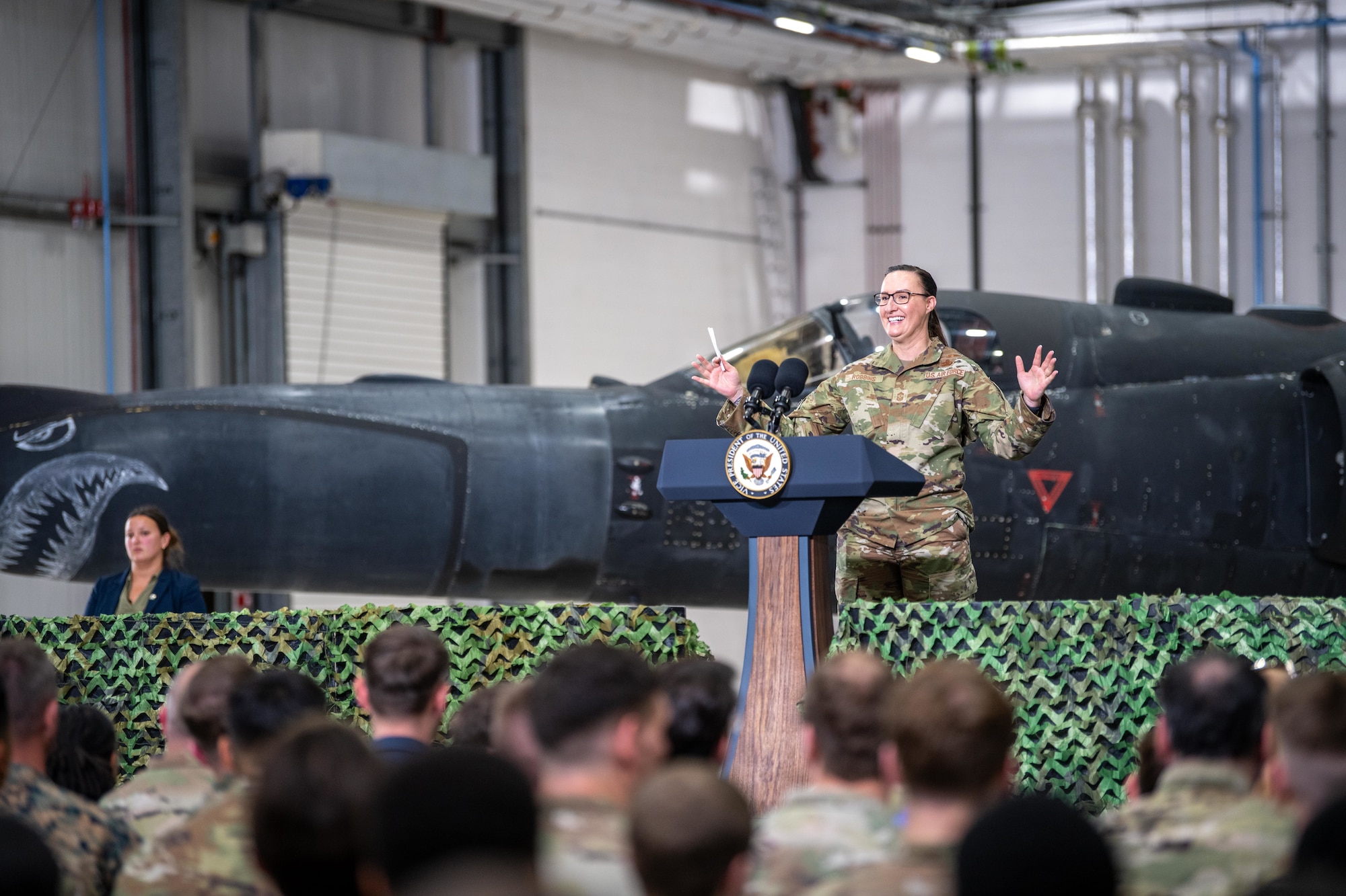 Chief Master Sgt. Melissa Robbins delivers remarks to Airmen