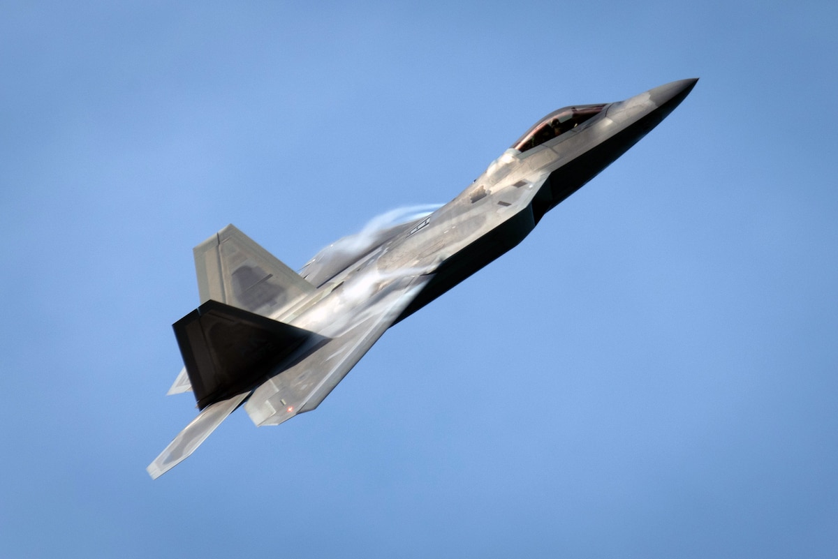 A U.S. Air Force F-22 Raptor assigned to the 3rd Air Expeditionary Wing conducts aerial maneuvers during exercise Resolute Force Pacific 2025 in Tinian, Northern Mariana Islands, July 17, 2025. REFORPAC demonstrates U.S. commitment to the region by building interoperability with allies and partners, advancing common interests and ensuring a free and open Indo-Pacific. (U.S. Air Force photo by Airman 1st Class Tala Hunt)