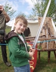 Crìsdean James Langan, age five, poses with a sword at a medieval festival in Aviemore, Scotland, summer 2008. Langan was born and raised in Scotland. (Courtesy Photo)