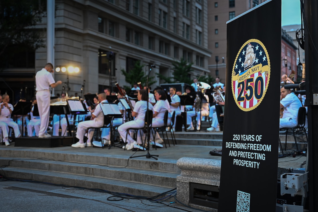 WASHINGTON (Aug 5, 2025) Members of the U.S. Navy Band perform during a concert on the avenue at the U.S. Navy Memorial. As we continue to celebrate the U.S. Navy's 250th birthday this year, events like these highlight the rich heritage, unwavering service, and strong sense of community that define our Navy. (U.S. Navy Photo by Mass Communication Specialist 1st Class Griffin Kersting)