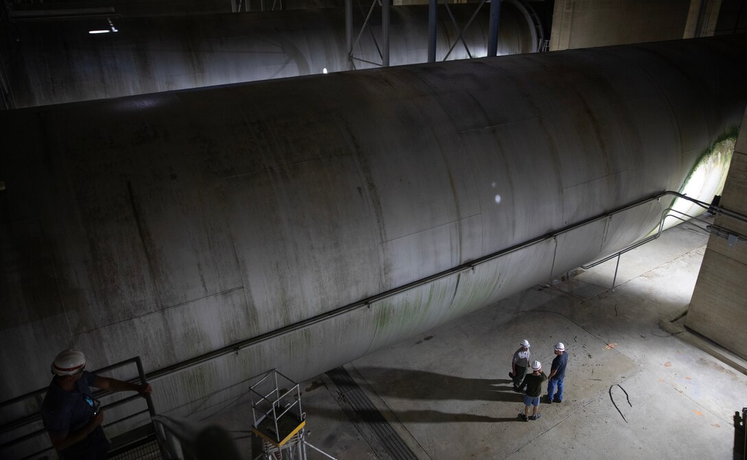 Kyle Parker, a cross-country canoe through-paddler, gets a tour of the U.S. Army Corps of Engineers, Omaha District’s Garrison Dam Project powerhouse penstock tunnels underneath the Missouri River’s riverbed in North Dakota, July 18, 2025.