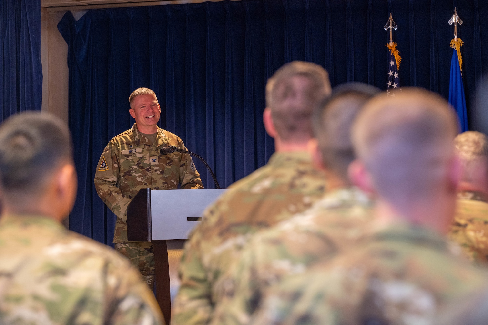 U.S. Space Force (USSF) Space Systems Command’s (SSC) Battle Management, Command, Control, Communications, and Space Intelligence (BMC3I) Program Executive Office activates Systems Delta 85 (SYD 85) at Peterson Space Force Base on August 8, 2025. USSF Col. Jason West deliveres a few words on the activation’s importance during his assumption of command of SYD 85. (U.S. Space Force photo by 2d Lt. Jacob S. Willoughby)