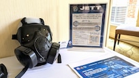 A table set up at the Next-Gen IP Industry Day displays information about JPEO-CBRND's Joint Enterprise Technology Tool (JETT).