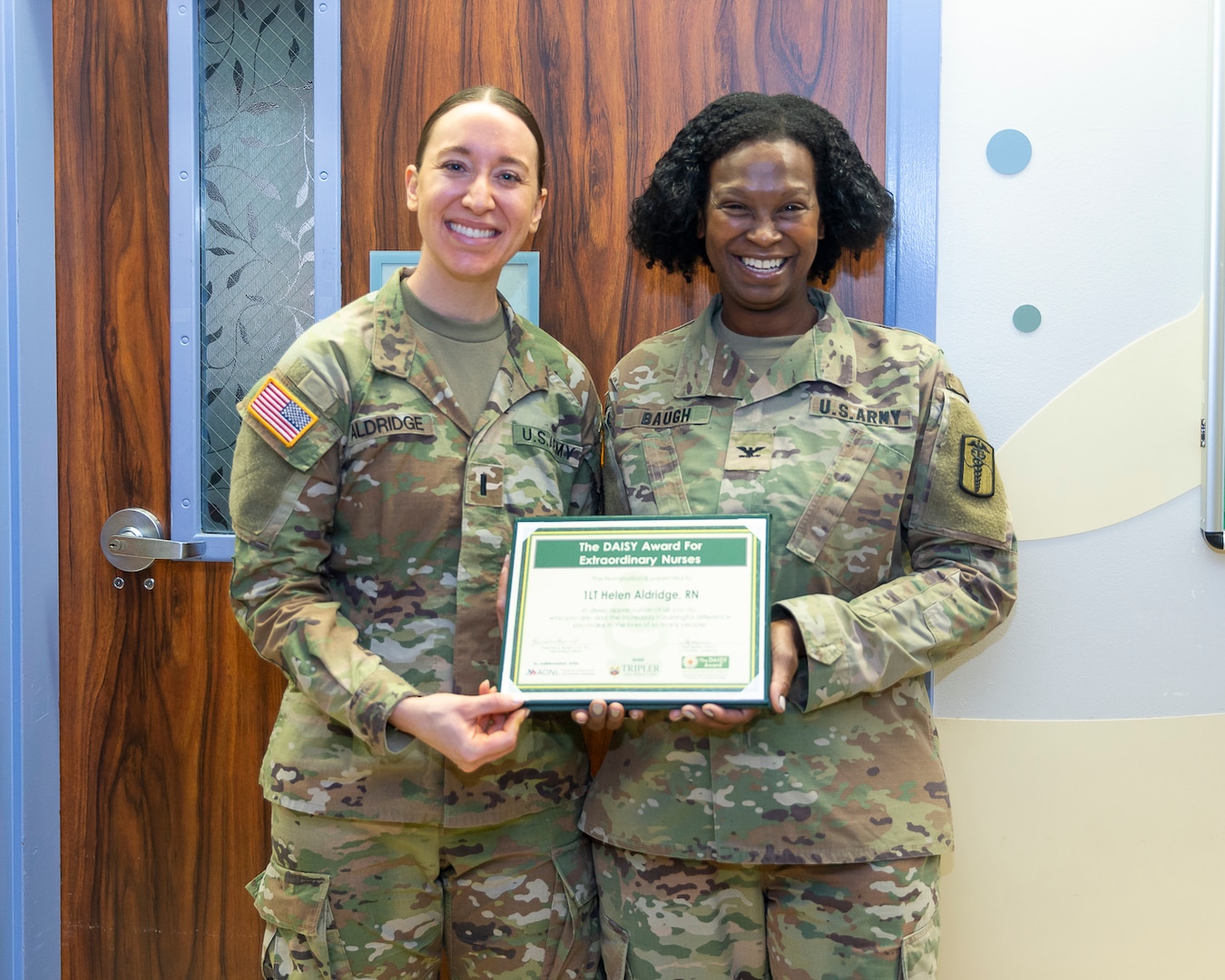 Congratulations to 1st Lt. Helen Aldridge, Tripler Army Medical Center's most recent Daisy Award recipient!

Aldridge, a pediatric nurse, was nominated for the award by the mother of a patient who was diagnosed with cancer. She wrote that "Nurse Helen" showed an incredible amount of compassion to the patient and her family. Col. Rosemary Baugh, TAMC's chief nursing officer, presented the award on April 14.