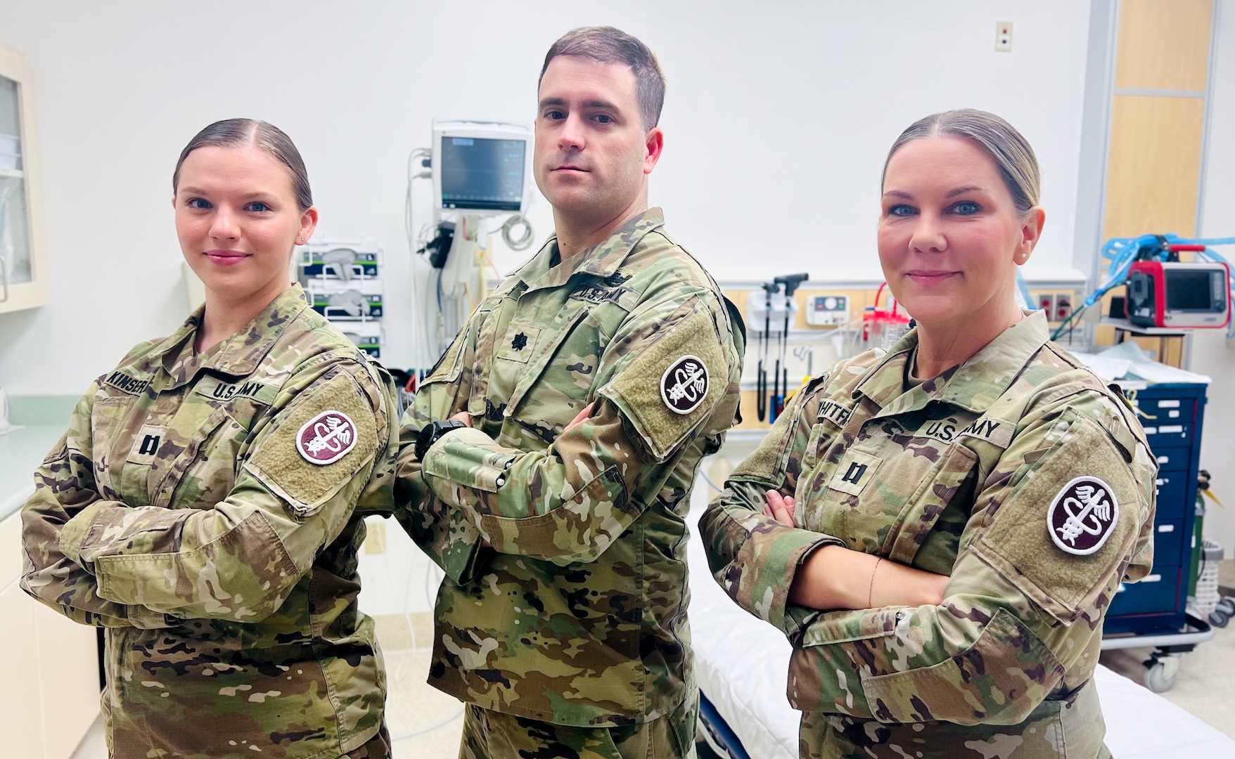 Winn Army Community Hospital's (From L to R) Capt. Natalia Kinser, chief nurse, intermediate care ward; Lt. Col. Daniel Bailey, chief of surgery; Capt. Alanna Whitfield, emergency room nurse, were part of the healthcare team that responded to the Aug.6. active shooter incident at Fort Stewart. They stabilized the five Soldiers wounded in the incident.
