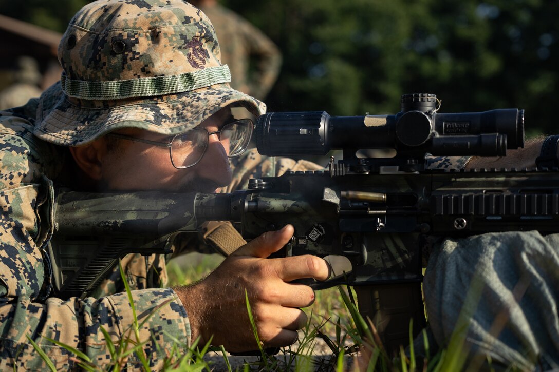 U.S. Marine Corps Lance Cpl. John Manoukian, a rifleman with 2nd Battalion, 23rd Marines, forward deployed with 4th Marine Regiment, 3d Marine Division as part of the Unit Deployment Program, fires his M27 Infantry Automatic Rifle at a battle sight zero range during the Korean Marine Exchange Program 25.2 in Pocheon, South Korea, July 26, 2025. KMEP is conducted regularly between the ROK and U.S. Marine Corps to increase their combined capabilities through realistic training geared towards deterrence and maintaining peace in the Indo-Pacific. (U.S. Marine Corps photo by Lance Cpl. Van Hoang)