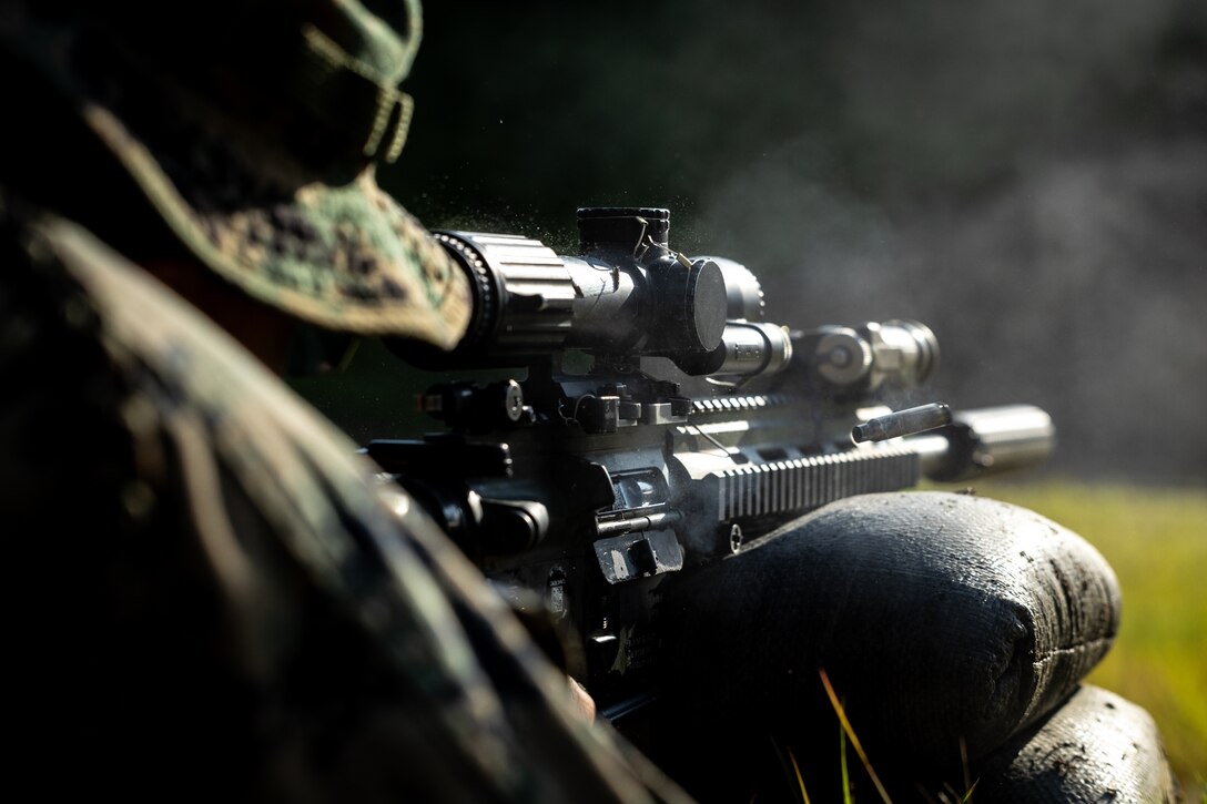 U.S. Marine Corps Cpl. Hayden Paul, a fireteam leader with 2nd Battalion, 23rd Marines, forward deployed with 4th Marine Regiment, 3d Marine Division as part of the Unit Deployment Program, fires his M27 Infantry Automatic Rifle at a target at a battle sight zero range during the Korean Marine Exchange Program 25.2 in Pocheon, South Korea, July 26, 2025. KMEP is conducted regularly between the ROK and U.S. Marine Corps to increase their combined capabilities through realistic training geared towards deterrence and maintaining peace in the Indo-Pacific. (U.S. Marine Corps photo by Lance Cpl. Van Hoang)