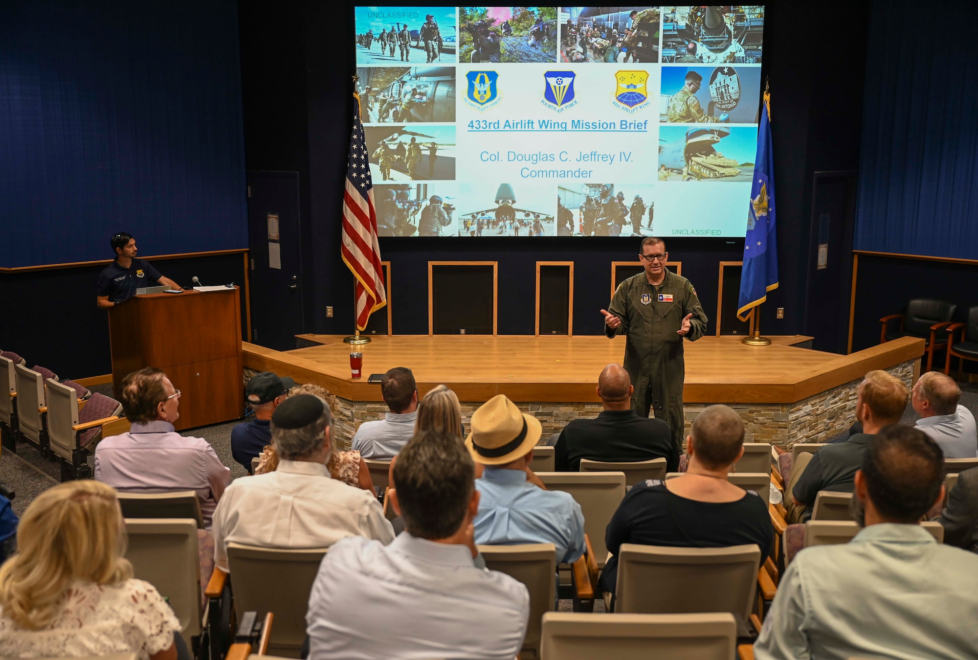Greater San Antonio FBI Academy leadership and their civic leaders visit the 433rd Airlift Wing and receive a mission brief by Col. Douglas C. Jeffrey, IV, 433rd AW commander, before a C-5M Super Galaxy tour at Joint Base San Antonio-Lackland, Texas, Aug. 5, 2025.